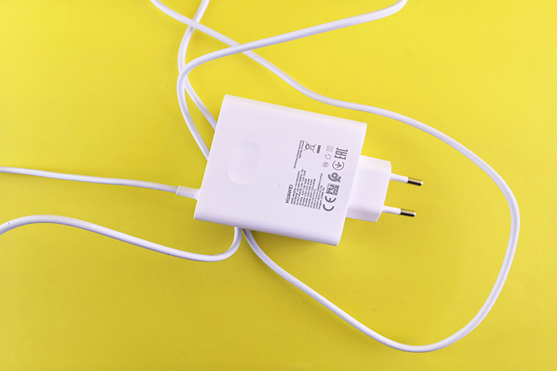 white two-pin plug charger
